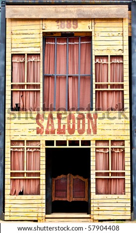 A front view of an old saloon.