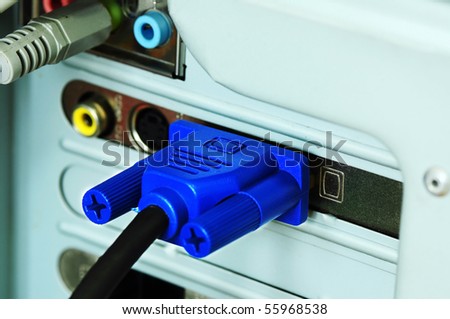 Blue plug connecting to computer.