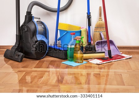 House cleaning -Cleaning accessories on floor room
