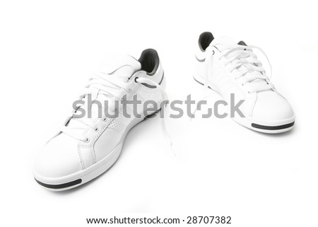 Pair of tennis sneakers over the white background