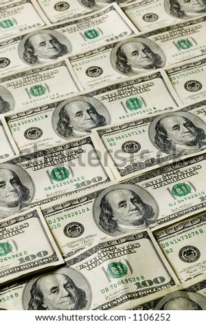 Money background pattern of one hundred dollar bills.