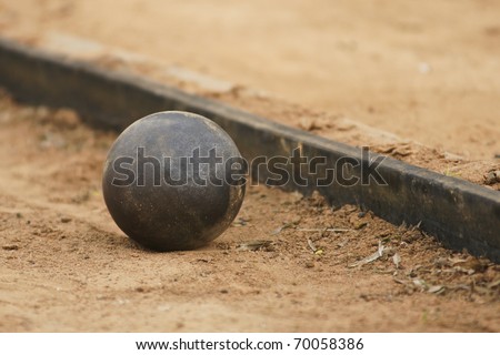 Shot put on athletic field.