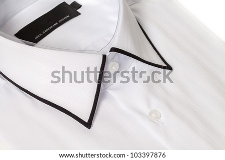 Close up view of a generic white business shirt with a line pattern