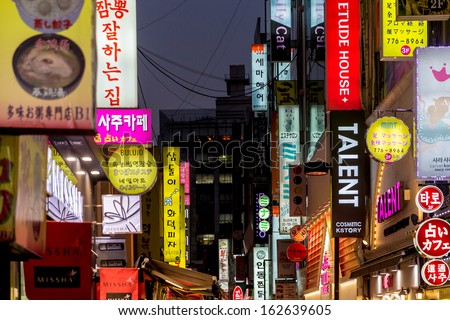SEOUL - NOVEMBER 5: Myeong-Dong Neon Lights November 5, 2013 in Seoul, South Korea. The location is the premiere district for shopping in the city.