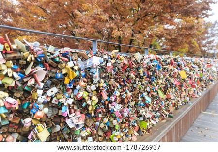 SEOUL,SOUTH KOREA - NOVEMBER 6: Plenty of key were locked along the wall on November 6, 2013 at Seoul tower. People believe that the locked key will keep their forever love.