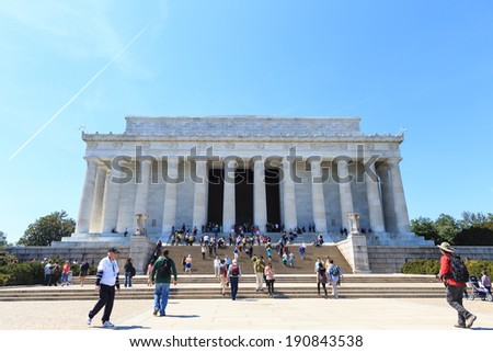 WASHINGTON, USA - APRIL 11, 2014: People visit Abraham Lincoln memorial in Washington. 18.9 million tourists visited capital of the United States.