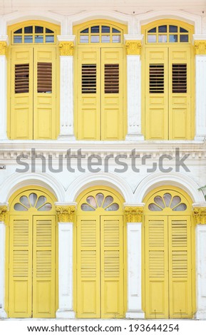 White building and wellow windows from singapore china town.