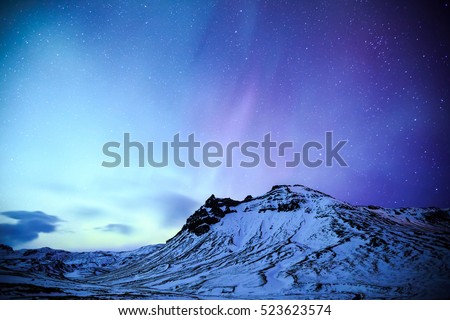 The Northern Light aurora over at snow Mountain Iceland