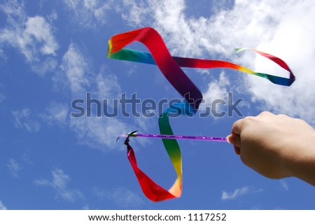 swinging the rainbow ribbon on the air