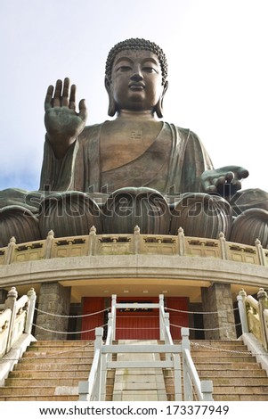 HONG KONG, JULY 02: Tian Tan Buddha on Lantau Island in Hong Kong on July 20, 2013. It is 34 meters tall and is a major centre of Buddhism in Hong Kong, it is also a popular tourist attraction