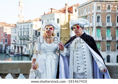VENICE, ITALY, February 23, 2014: Carnival of Venice, beautiful masks at St. Mark\'s Square