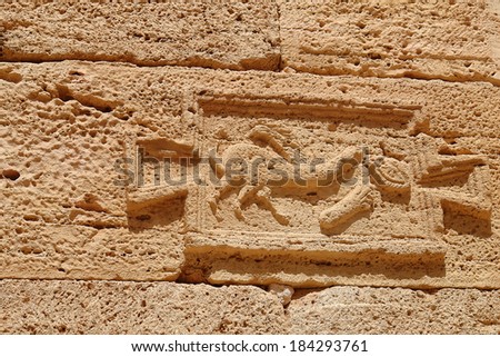 Indication Roman road in the archaeological site of Leptis Magna, Libya
