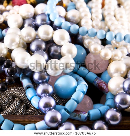 Closeup, necklaces with colored stones, jewelry, bijouteria