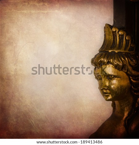 Woman face, detail of antique furniture on grunge texture