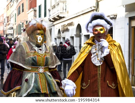VENICE, ITALY, FEBRUARY 12, 2012: Carnival of Venice, beautiful masks at St. Mark\'s Square