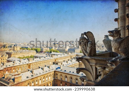 Notre Dame of Paris: Famous Chimera, demon, overlooking the Eiffel Tower at a summer day in vintage style