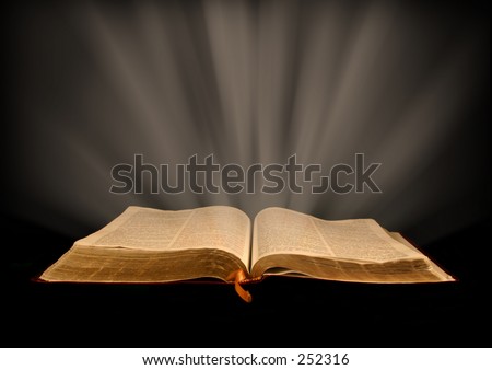 Open Bible with rays of light