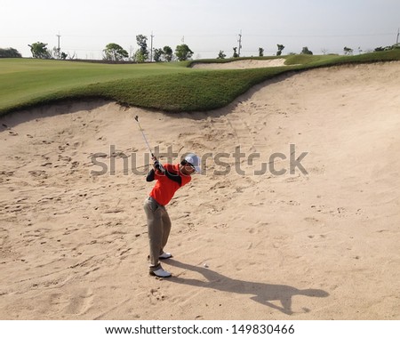Golfer on the sand trap
