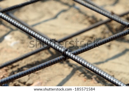 Steel rods or bars used to reinforce concrete