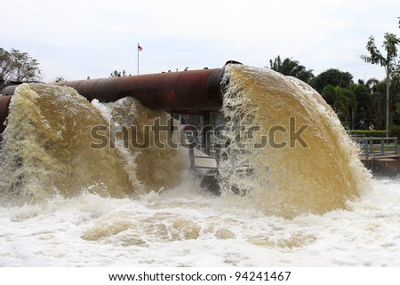 Flood water being pumped from pump station