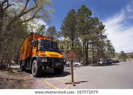 BANDELIER NATIONAL MONUMENT, NEW MEXICO, USA - April 17: Custom orange RV truck parked at visitor center on April 17, 2014 at Bandelier National Monument , New Mexico, USA.