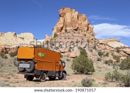 CAPITOL REEF NATIONAL PARK, UTAH, USA - May 2: Custom Expedition Vehicle RV driving on dirt road in the Capitol Reef, Utah on May 2, 2014.