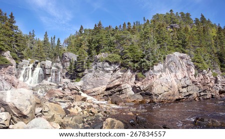 Waterfall on the coast of Atlantic Ocean, Cape Breton, Nova Scotia, Canada