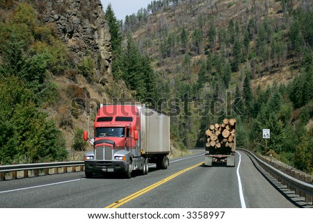 Logging truck on winding mountain road