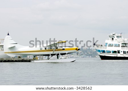 Sea plane and Cruise ship on Union Bay Lake, Seattle, USA