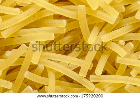 Dry noodle Italian pasta uncooked closeup