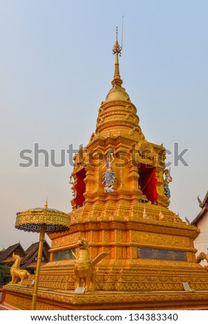 Golden stupa in Thailand, Buddha religion sign.
