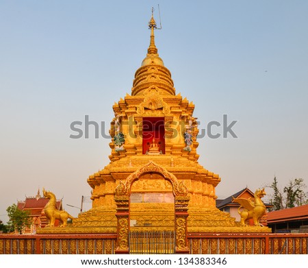 Golden stupa in Thailand, Buddha religion sign.