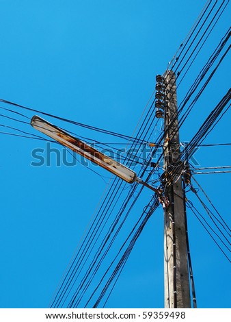 Electric wire with neon lamp / a  confusion Electric wire in blue sky