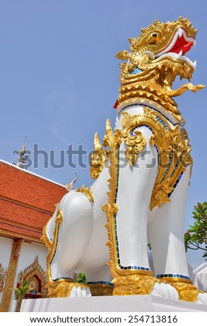 sculptured gold white singha  stand