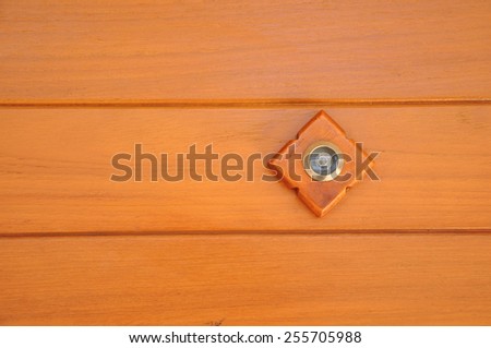 peephole eye hole orange wood door