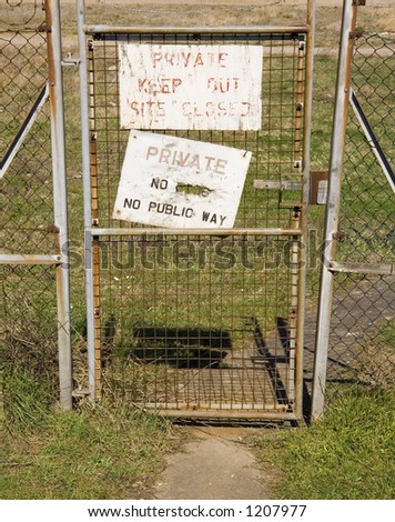 Private keep out sign on wire gate.