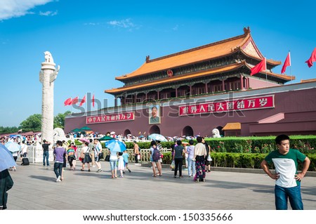 BEIJING, CHINA - JUNE 30: Tourists crowd into the Forbidden City on July 30, 2013 in Beijing, China.