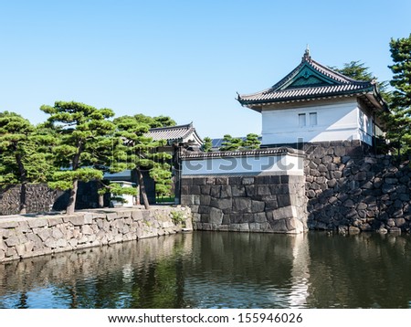 A guard tower stands across the moat at the Imperial Palace in Tokyo, Japan.