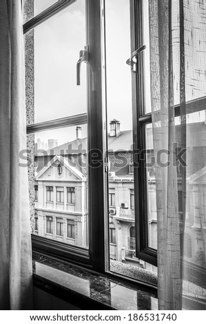 An open window in black and white.