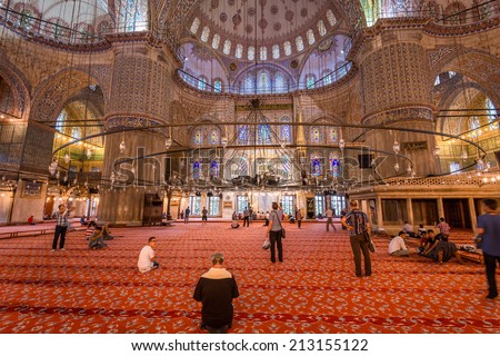 ISTANBUL, TURKEY - AUGUST 3: Muslims pray in the Blue Mosque on August 3, 2014 in Istanbul, Turkey.