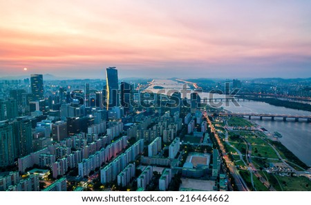 The skyscrapers of Seoul light up as evening comes on in South Korea.