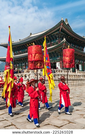 SEOUL, SOUTH KOREA - OCTOBER 19: Korean soldiers re-enact the king\'s procession at Gyeongbokgung Palace on October 19, 2014 in Seoul, South Korea.