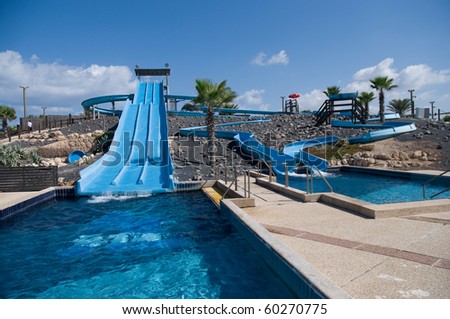Water park view , with slides and swimming pool .