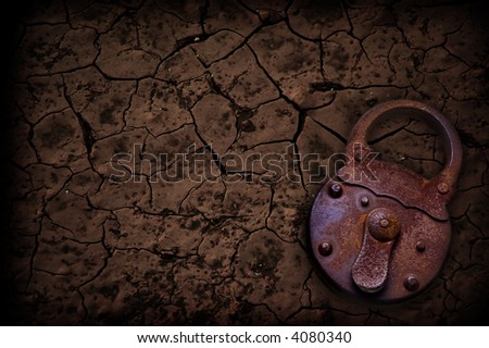 rusty padlock with a crackled background