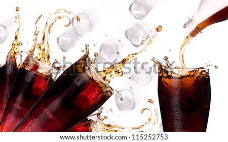 Fresh cola drink background with ice and splash isolated on a white