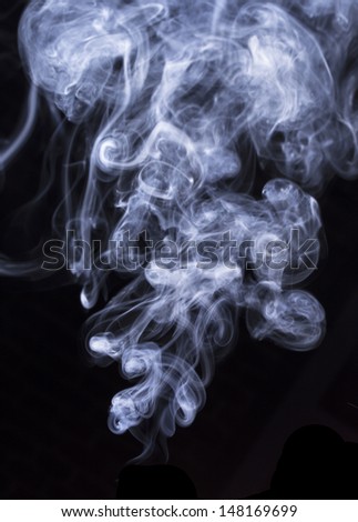 Abstract cigar smoke on a black  background