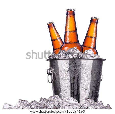 Beer Bottles In Ice Bucket Isolated On White