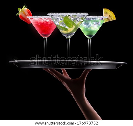 alcohol cocktail set on a black. Berry cooler cocktail, martini, mojito