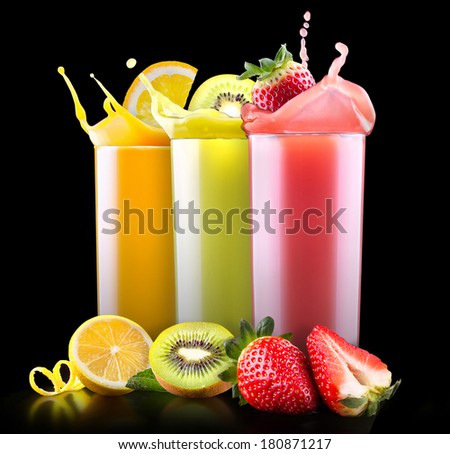 set of tasty summer fruits with juice in glass and tube