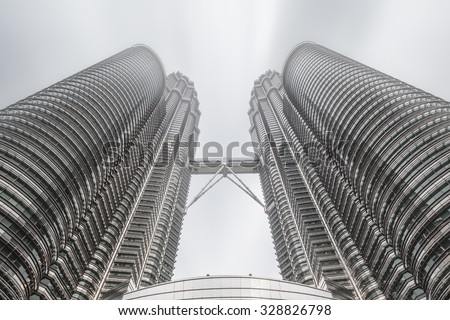 KUALA LUMPUR,MALAYSIA - CIRCA MAY 2015: The Petronas Towers,Petronas Twin Towers are twin skyscrapers in Kuala Lumpur, Malaysia. Malaysia.Malaysia is a member of Asean Economic Community